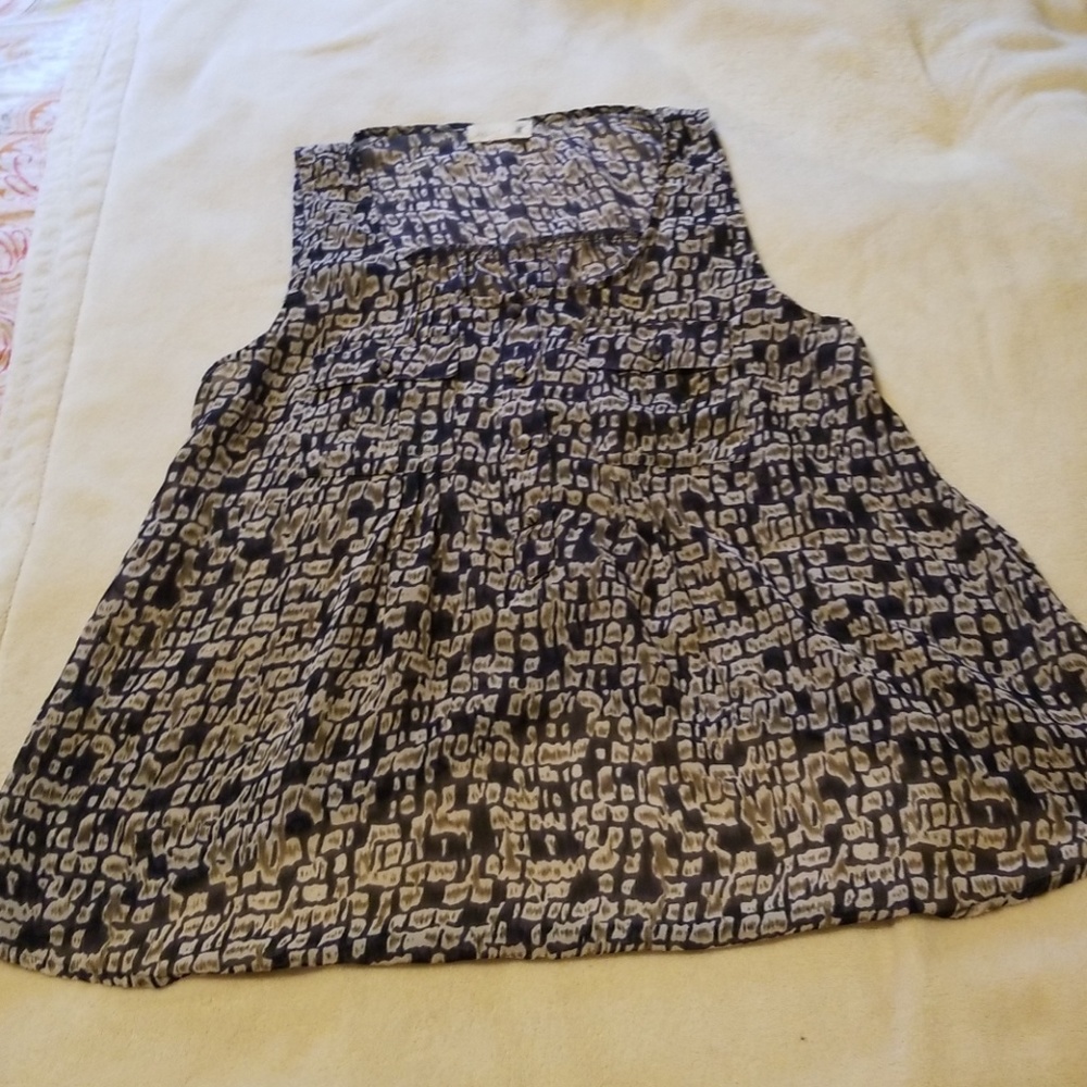 Mine....  tank with buttons and pockets